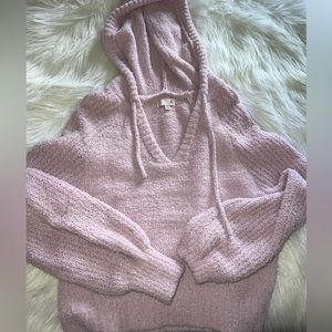 Pink sweater with a hood